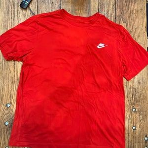 Red Nike men's size large shirt with embroidered logo
